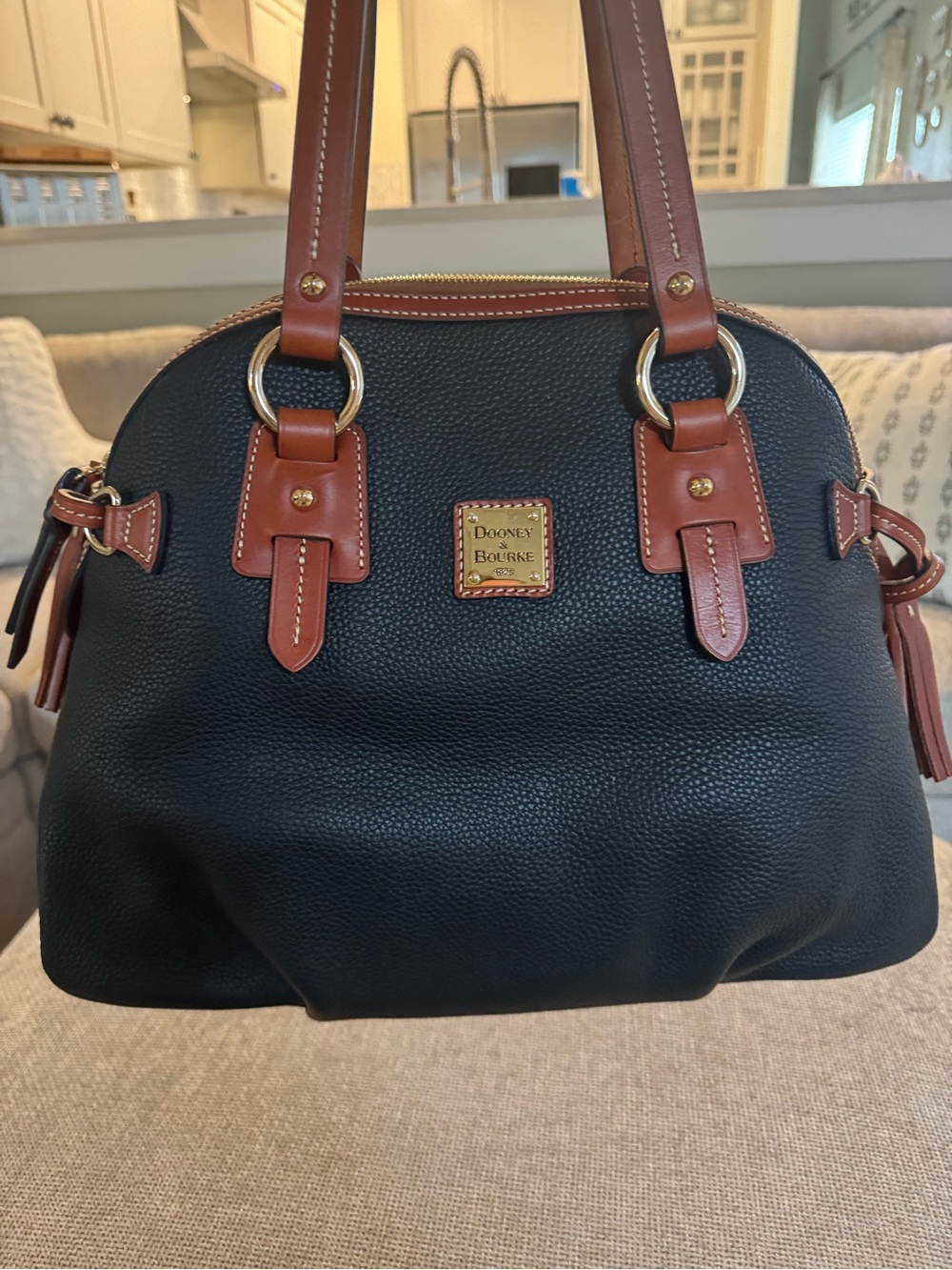 Dooney & Bourke Black Pebbled Leather Satchel with Brown Trim and Gold Hardware